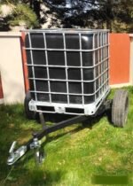 vandens talpa su priekabėle